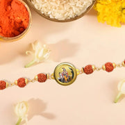 Diviniti krishna with Surbhi Cow Rudraksha Rakhi with 24K Gold Plated Foil Divine Raksha Bandhan Gift