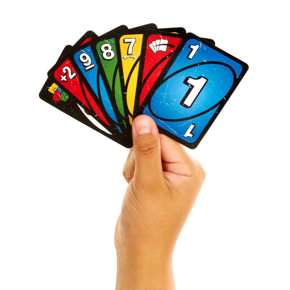 Mattel Games UNO Show ‘em No Mercy Card Game for Kids, Adults & Family Parties and Travel with Extra Cards, Special Rules and Tougher Penalties.