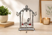 KridayKraft Silver Plated Metal Krishna Jhula with Elephant Design Stand | Lord Krishna on Swing Idol for Home Decor, Janmashtami Puja, Temple, & Spiritual Gifting.