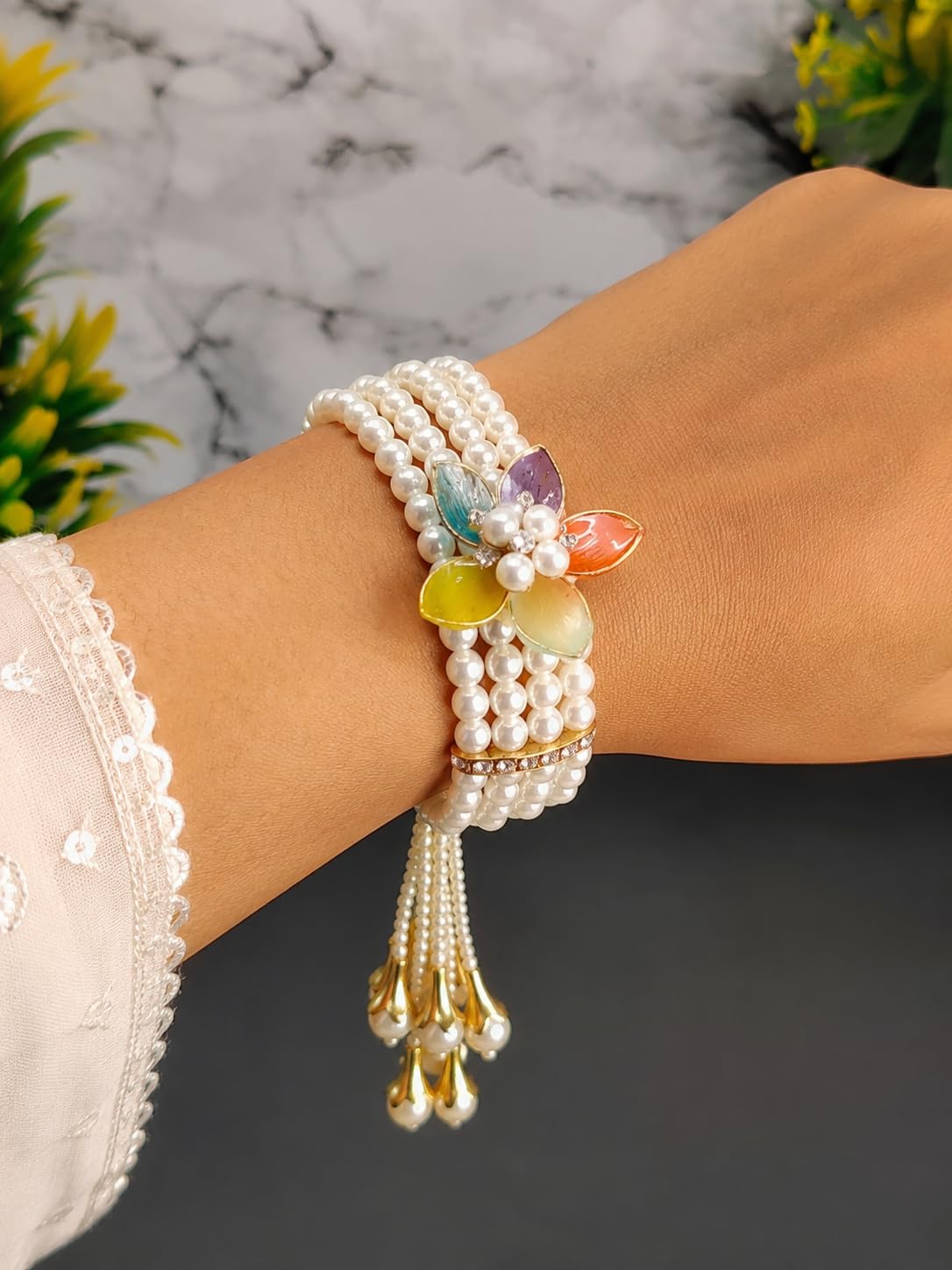 NMII Designer Plastic Pearl Bracelet For Women & Girls With Multicolor Flower Charm | Gold Tone Finish, Gemstone & Pearl Bead Work | Beautiful Hand Bracelet For Wedding, Party, Festival & Festive