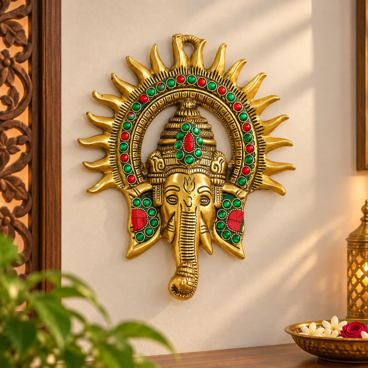 KRIDAY Kraft Kiran Ganesha Wall Hanging, 22 cm Ganpati Idol with Surya Chakra and Red-Green Stone Work, Gold Finish Wall Décor for Home Entrance, Pooja Room, Living Room and Housewarming Gift