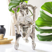 KridayKraft Metal Chair Ganesh ganpati Idol with Reading Ramayan Home Decoration and Gifts for Your Love Once