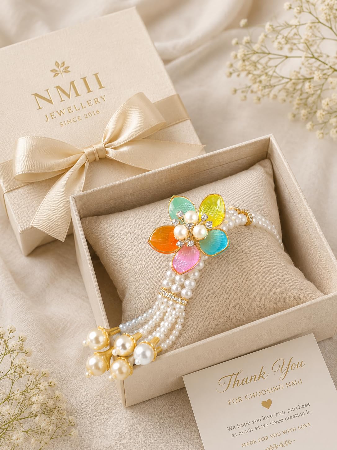 NMII Designer Plastic Pearl Bracelet For Women & Girls With Multicolor Flower Charm | Gold Tone Finish, Gemstone & Pearl Bead Work | Beautiful Hand Bracelet For Wedding, Party, Festival & Festive