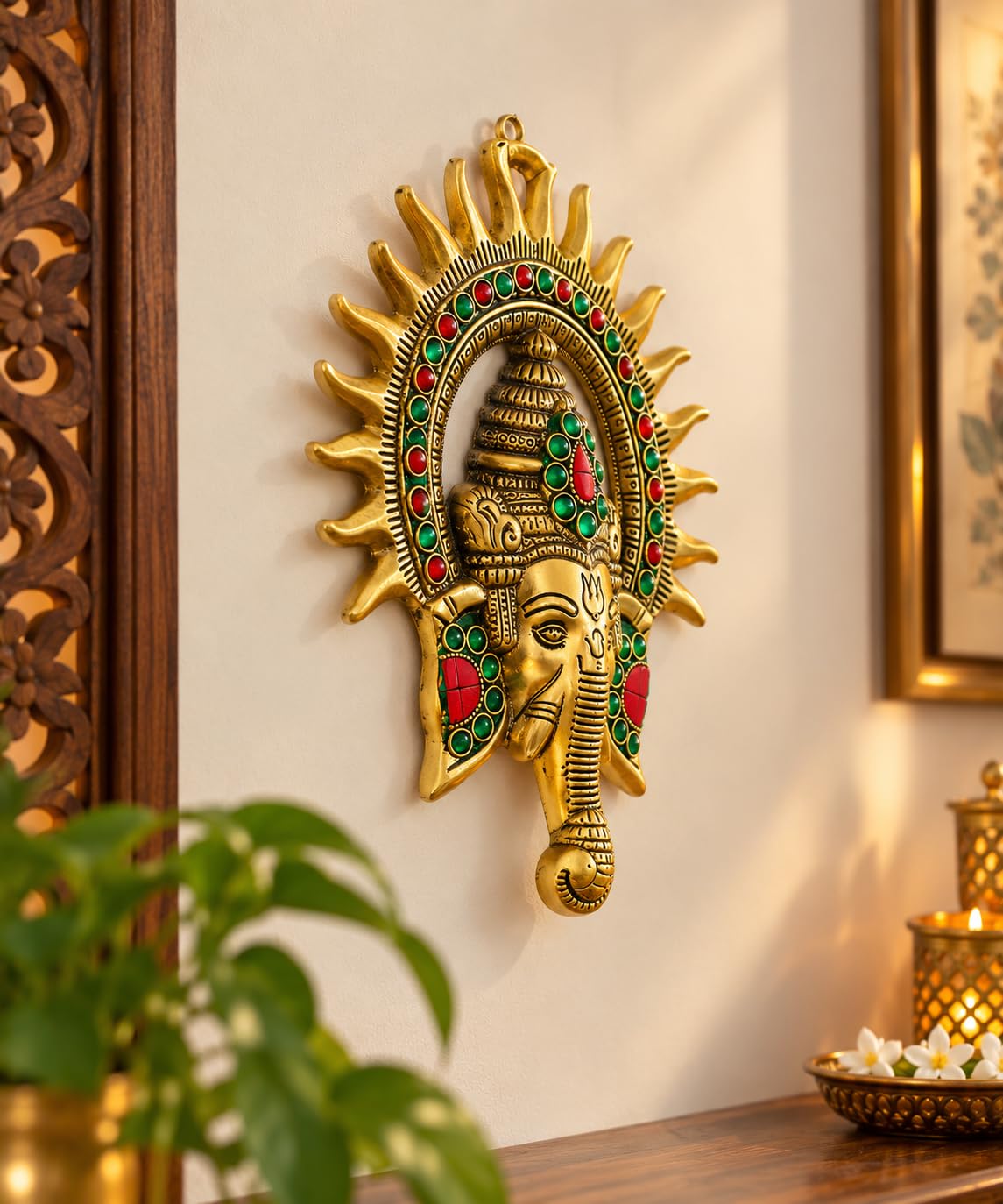 KRIDAY Kraft Kiran Ganesha Wall Hanging, 22 cm Ganpati Idol with Surya Chakra and Red-Green Stone Work, Gold Finish Wall Décor for Home Entrance, Pooja Room, Living Room and Housewarming Gift