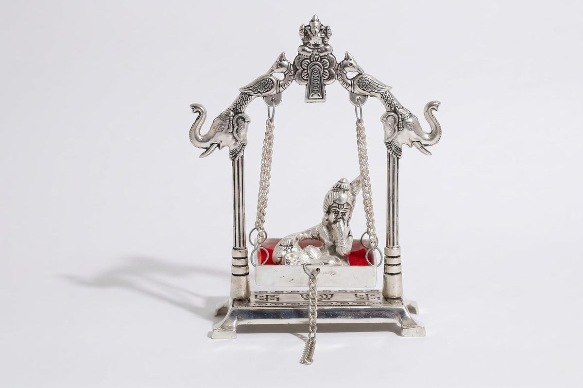 KridayKraft Silver Plated Metal Krishna Jhula with Elephant Design Stand | Lord Krishna on Swing Idol for Home Decor, Janmashtami Puja, Temple, & Spiritual Gifting.