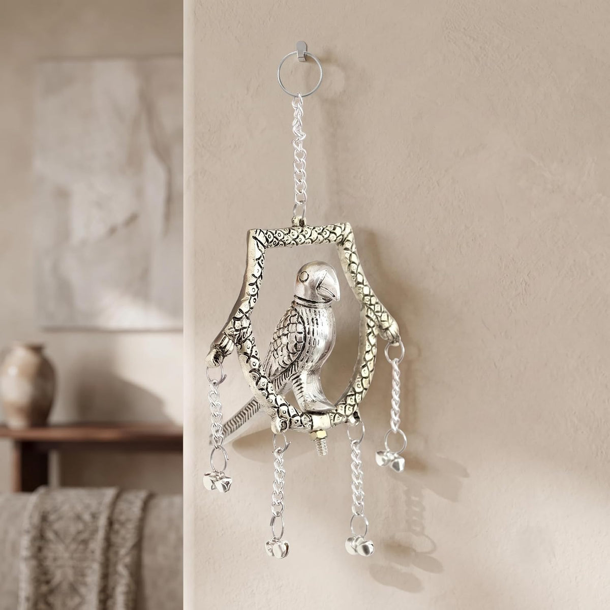 KridayKraft Silver Plated Tikona Parrot Metal Hanging Décor with Chains and Bells | Traditional Indian Wall Hanging Showpiece for Living Room, Home Entrance & Vastu (22 cm x 12 cm)