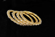 NMII Alloy Metal with White Pearls & Golden Balls Designer Bangles Set For Women & Girls | Kada Set For Women | Traditional Women's Bangles For Wedding, Party, Festive, Occasion Wear- Set of 4