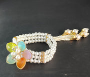 NMII Designer Plastic Pearl Bracelet For Women & Girls With Multicolor Flower Charm | Gold Tone Finish, Gemstone & Pearl Bead Work | Beautiful Hand Bracelet For Wedding, Party, Festival & Festive