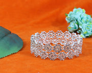 NMII Alloy With Zircon Gemstone and Flower Pattern Glossy Finished Kada set for Women and Girls, (Pack of 2 Kada set)