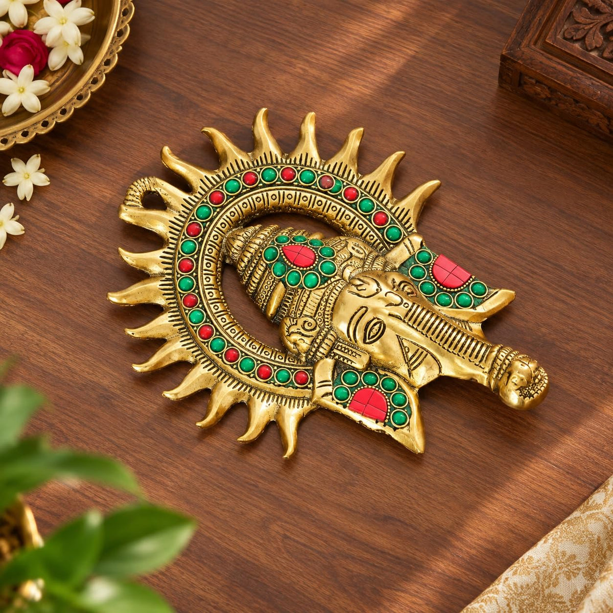 KRIDAY Kraft Kiran Ganesha Wall Hanging, 22 cm Ganpati Idol with Surya Chakra and Red-Green Stone Work, Gold Finish Wall Décor for Home Entrance, Pooja Room, Living Room and Housewarming Gift
