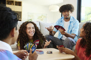 Mattel Games UNO Show ‘em No Mercy Card Game for Kids, Adults & Family Parties and Travel with Extra Cards, Special Rules and Tougher Penalties.
